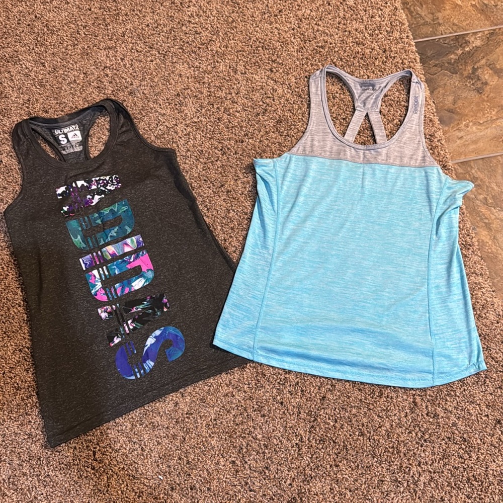 Adidas and Reebok tanks size small.